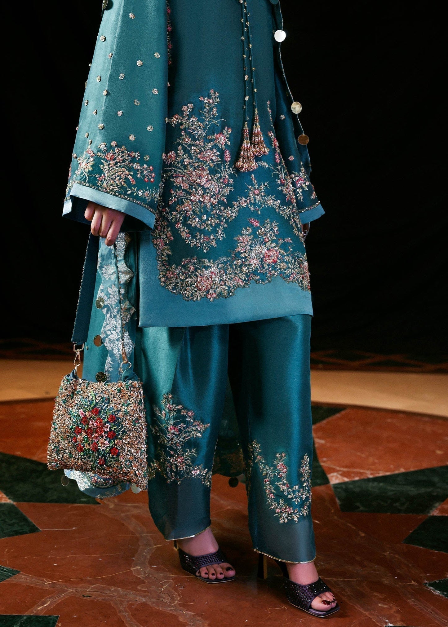Hussain Rehar Verta ensemble featuring a refined silhouette with intricate embellishments and luxurious fabric in a fluid drape, paired with a beautifully detailed dupatta, perfect for formal occasions and elegant celebrations.