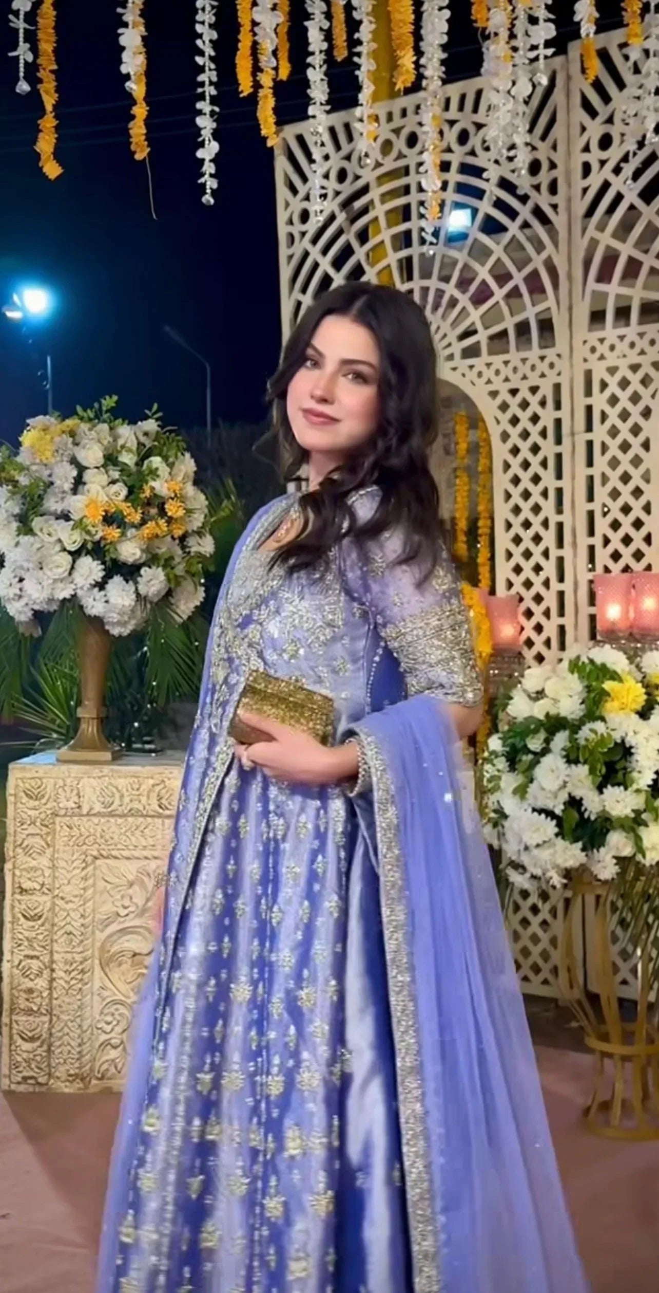Haris Shakeel inspired Eyena ensemble in soft periwinkle-lilac featuring intricate silver zari, sequins, and resham embroidery delicately scattered across flowing panels with a richly embellished border, paired with a sheer net dupatta, perfect for festive occasions, mehndi functions, nikkah ceremonies, and formal gatherings.