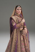 Fahad Hussayn Mirbail wine net lehenga choli featuring a structured corset-style blouse with intricate embroidery and handwork embellishments, paired with a flowing net lehenga in rich wine color and a lightweight net dupatta with an exquisitely embellished border, perfect for bridal wear, weddings, receptions, and festive celebrations.