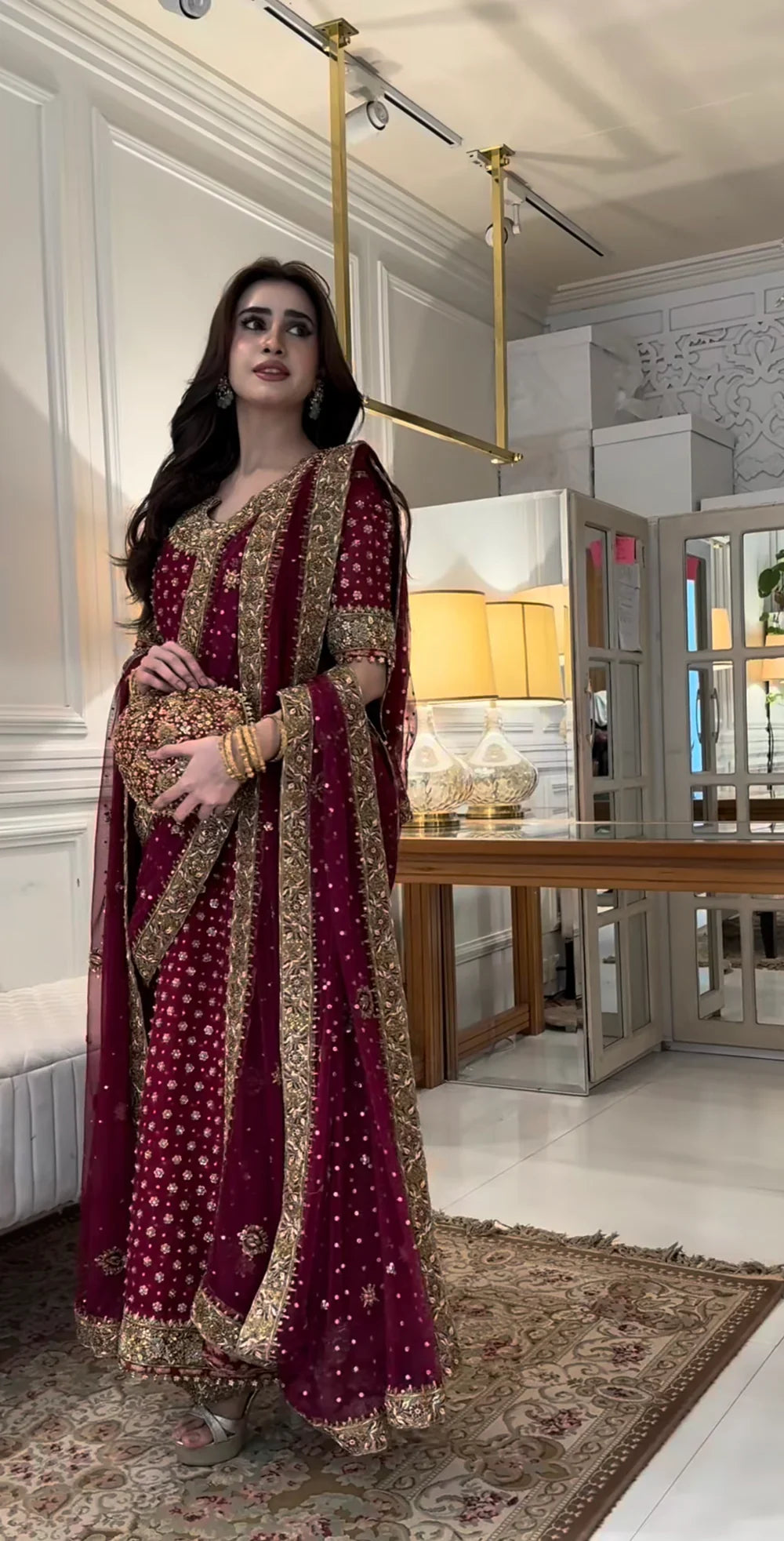 Haris Shakeel Aisha Afridi Pakistani designer formal ensemble crafted in rich tones with intricate embellishments and refined craftsmanship, featuring delicate details that blend tradition and sophistication, perfect for grand occasions and weddings.