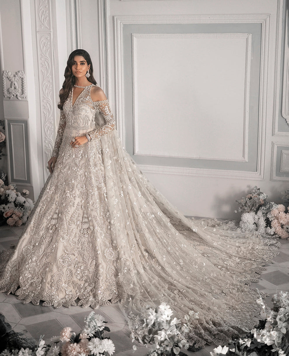  Republic Womenswear E-52 modern glamour ensemble featuring intricate embellishments and artful embroidery on luxurious fabric with a flattering flowing silhouette, perfect for galas, special occasions, and formal events.