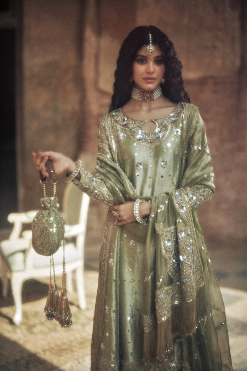 Iqbal Hussain Pistachio pistachio and gold bridal lehenga choli featuring intricate hand embroidery, delicate zari work, and fine embellishments with ornate floral and traditional motifs and shimmering accents, paired with a matching embellished choli and a soft net dupatta with detailed borders, perfect for barat, nikah, walima, and formal wedding receptions.
