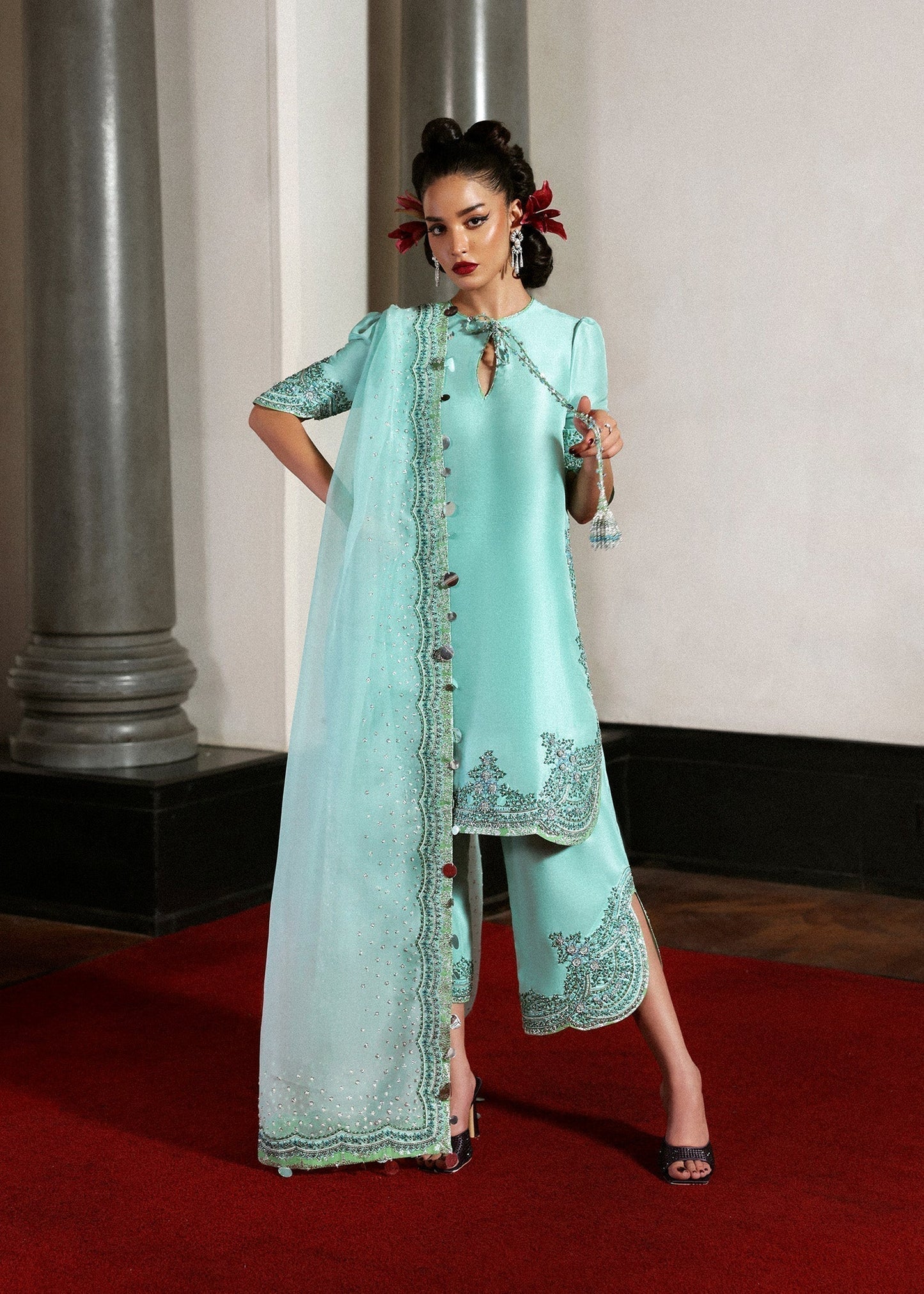 Hussain Rehar Mynt ensemble crafted from luxurious fabric featuring delicate embellishments with refined tailoring and graceful flow in soothing tones, paired with an accompanying dupatta, perfect for formal occasions and elegant celebrations.